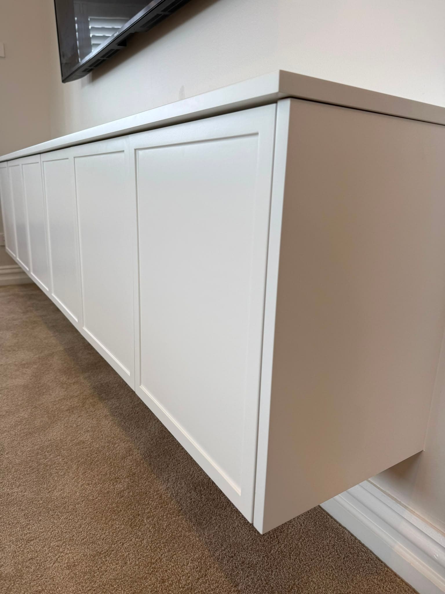 Built-in media unit installed by A&E Joinery